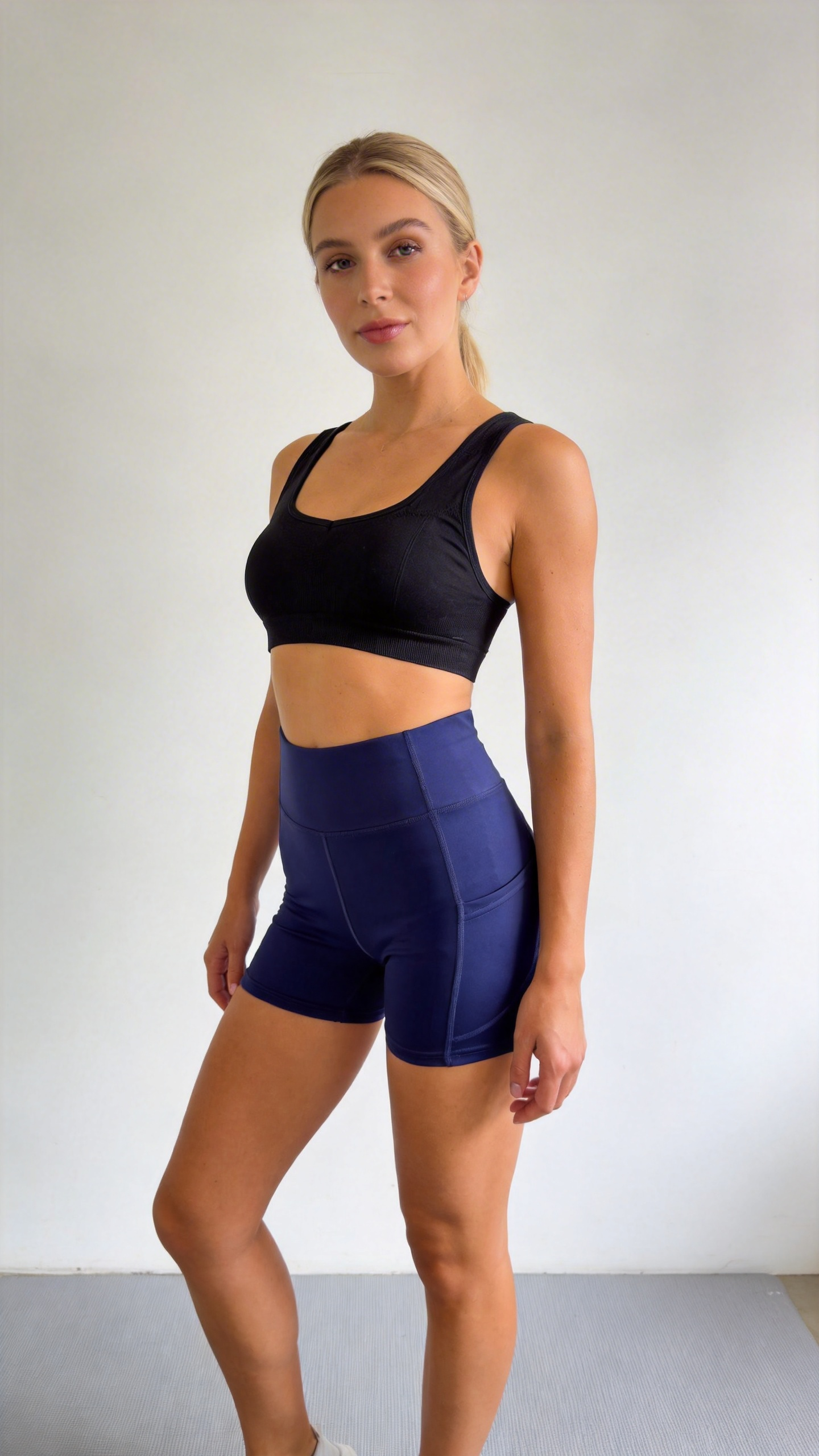 High-Waist Navy Yoga Shorts with Side Pockets